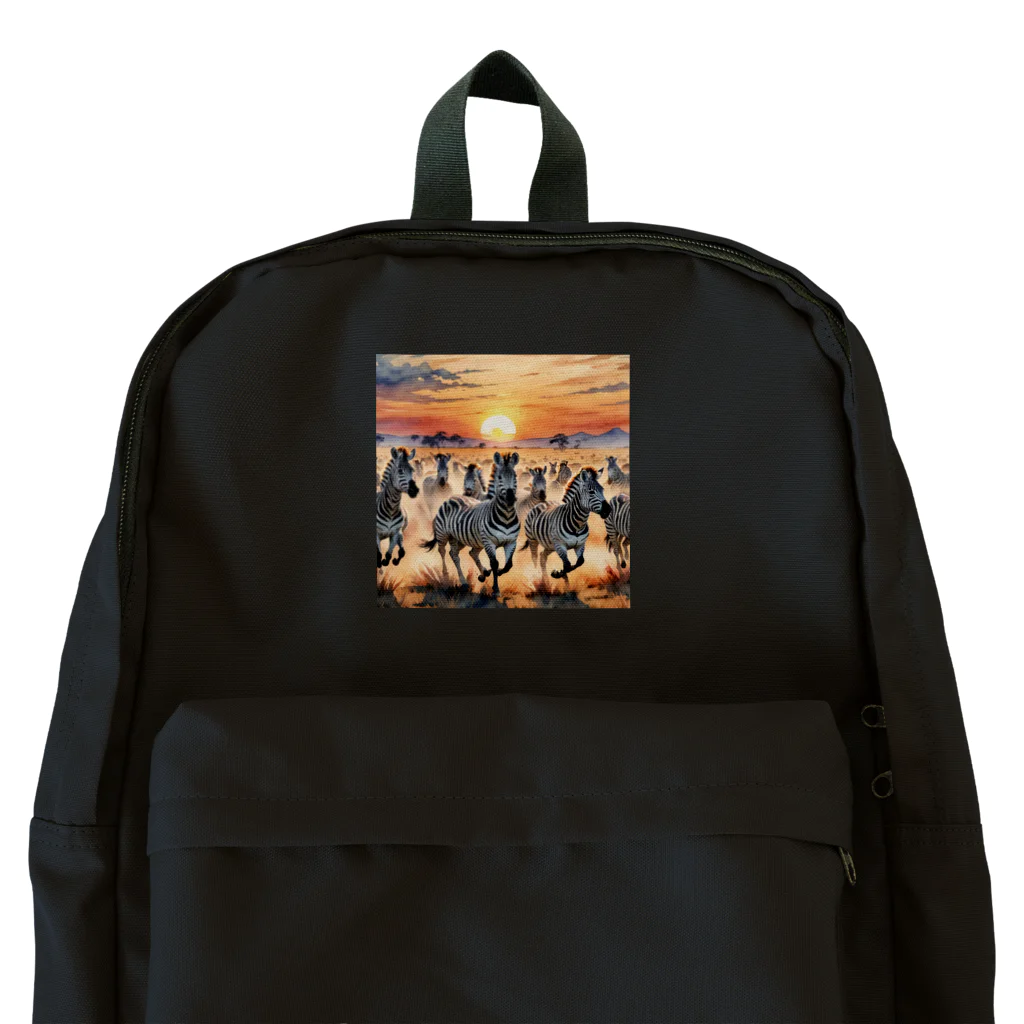 nigihayahiの夕焼けを走るシマウマ Backpack