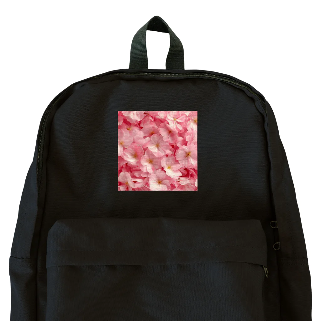 オンラインショップイエローリーフのピンクの花　鮮やか Backpack