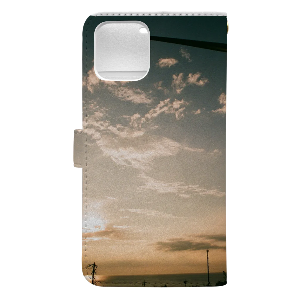 Issei Mの夕暮れの海と風車 Book-Style Smartphone Case :back