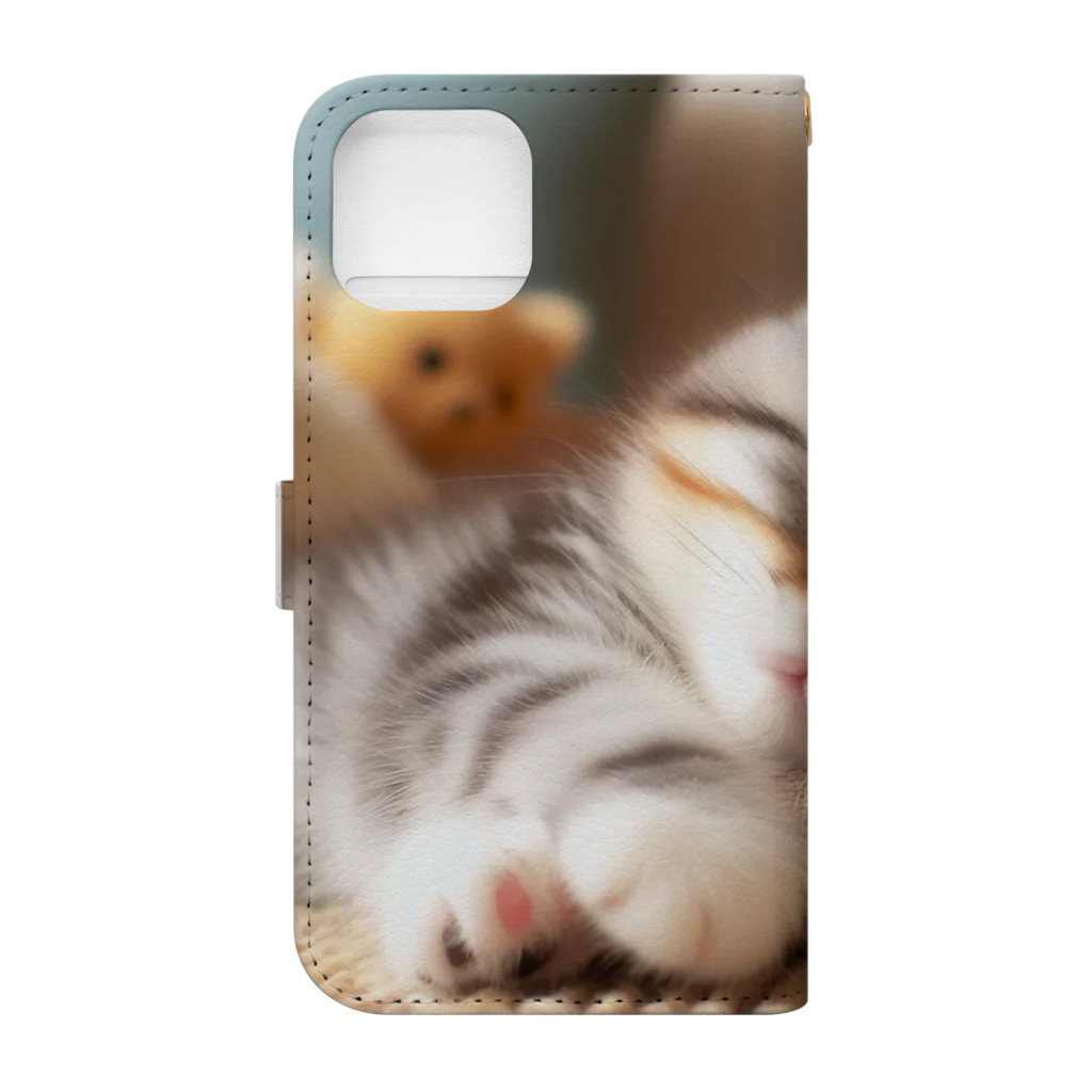 終わらない夢🌈の眠るにゃんこ😺zzz 手帳型スマホケースの裏面