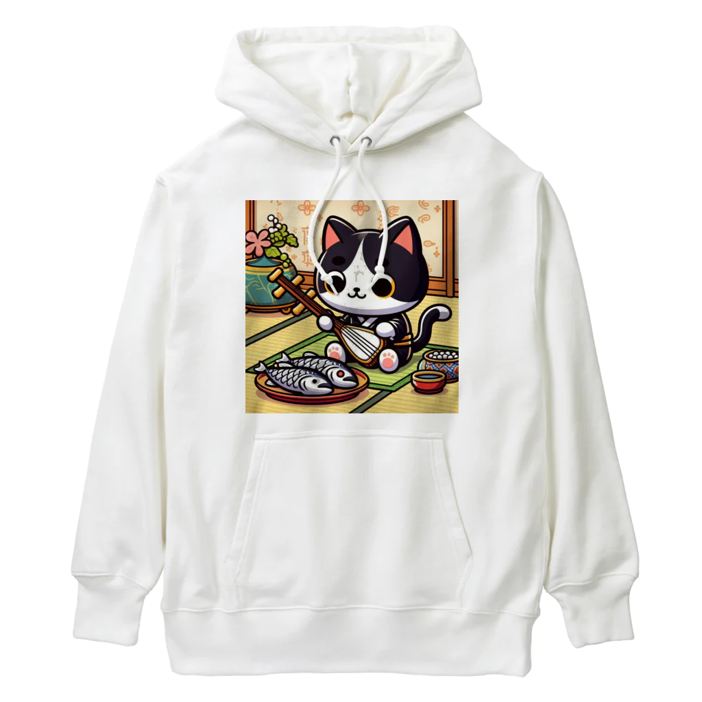 ネコ好きさんのショップの三味線をひく猫 Heavyweight Hoodie