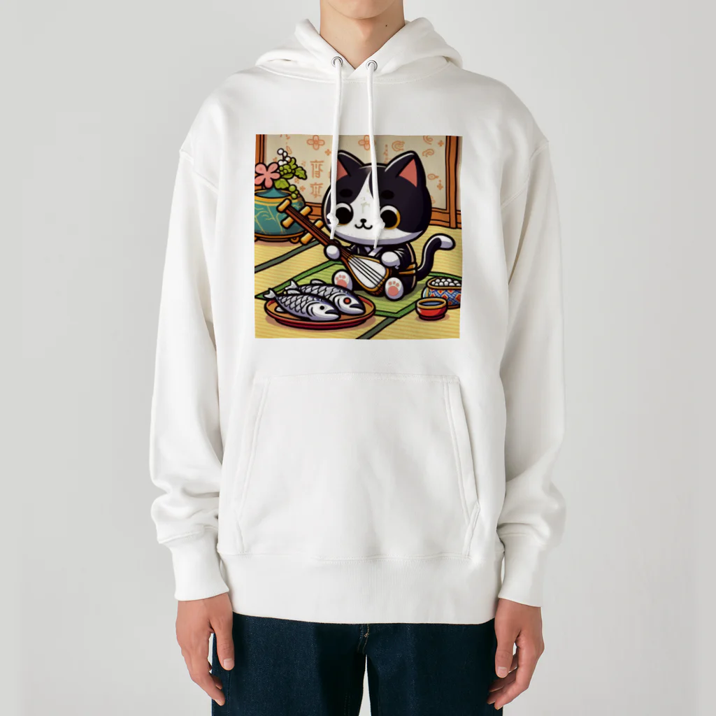 ネコ好きさんのショップの三味線をひく猫 Heavyweight Hoodie