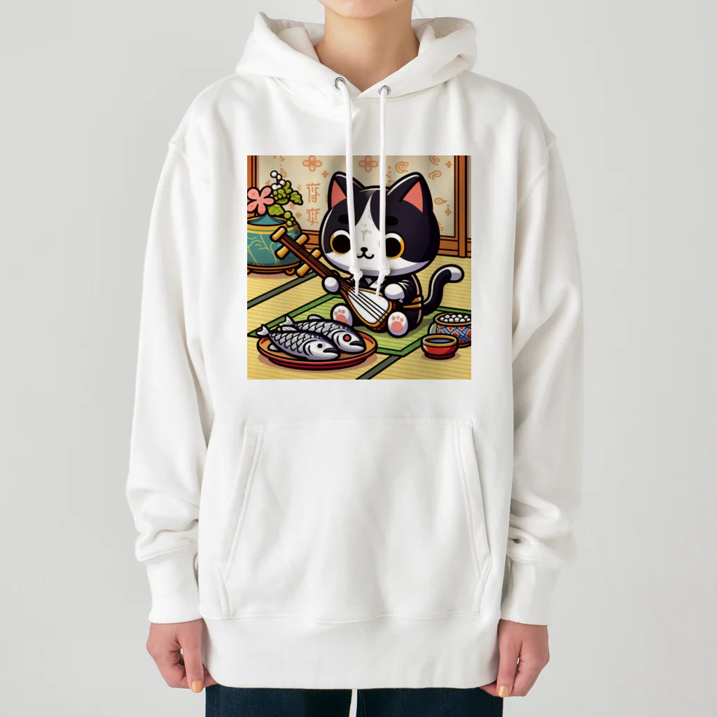 ネコ好きさんのショップの三味線をひく猫 Heavyweight Hoodie