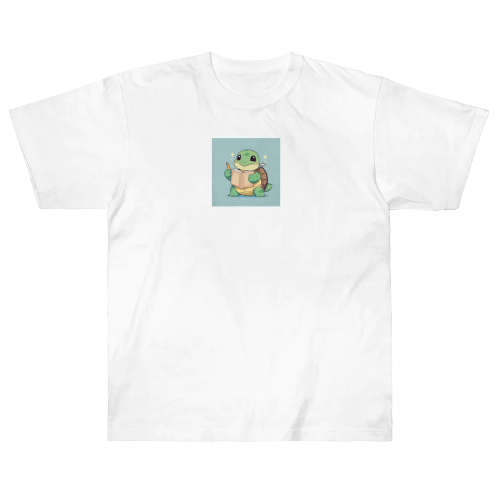 ganeshaのおもちゃの本を持ったかわいいカメ Heavyweight T-Shirt