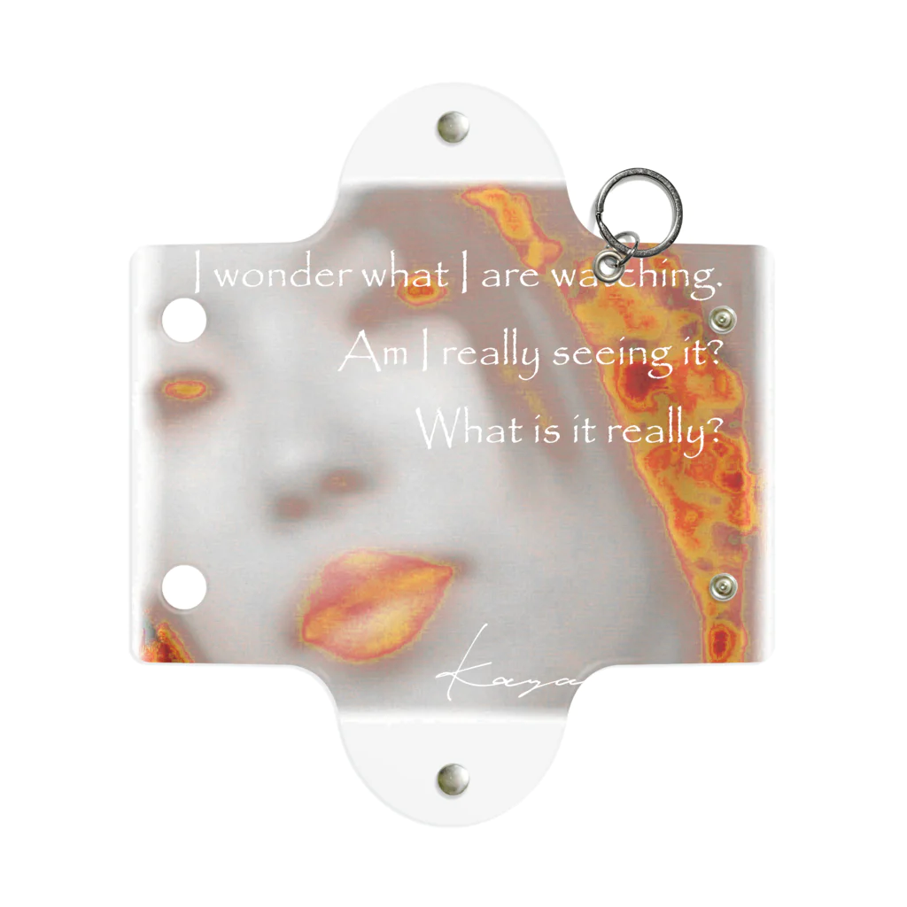 Kazumichi Otsubo's Souvenir departmentの A woman looking down ~ with text Mini Clear Multipurpose Case