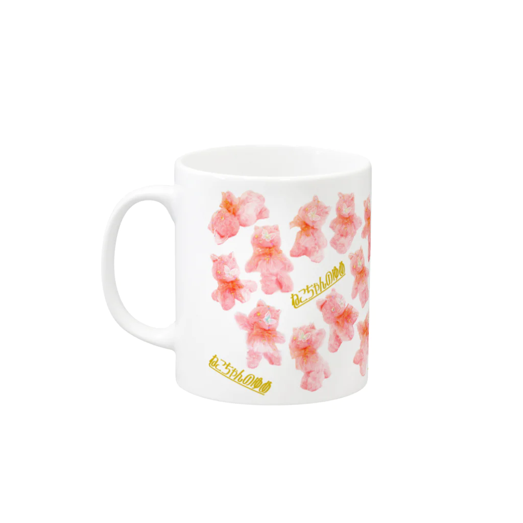 ショートアニメ『ねこちゃんのゆめ』OFFICIAL ONLINE STOREのねこちゃん総柄マグカップ Mug :left side of the handle