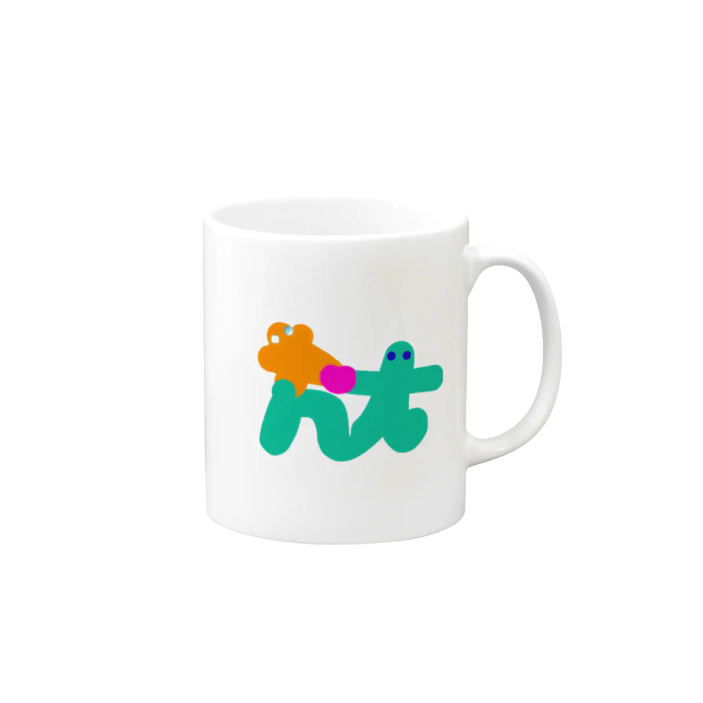 とみーくまのそれとなくハッピーライフショップのにゅーたうんとみーロゴマグカップ Mug :right side of the handle