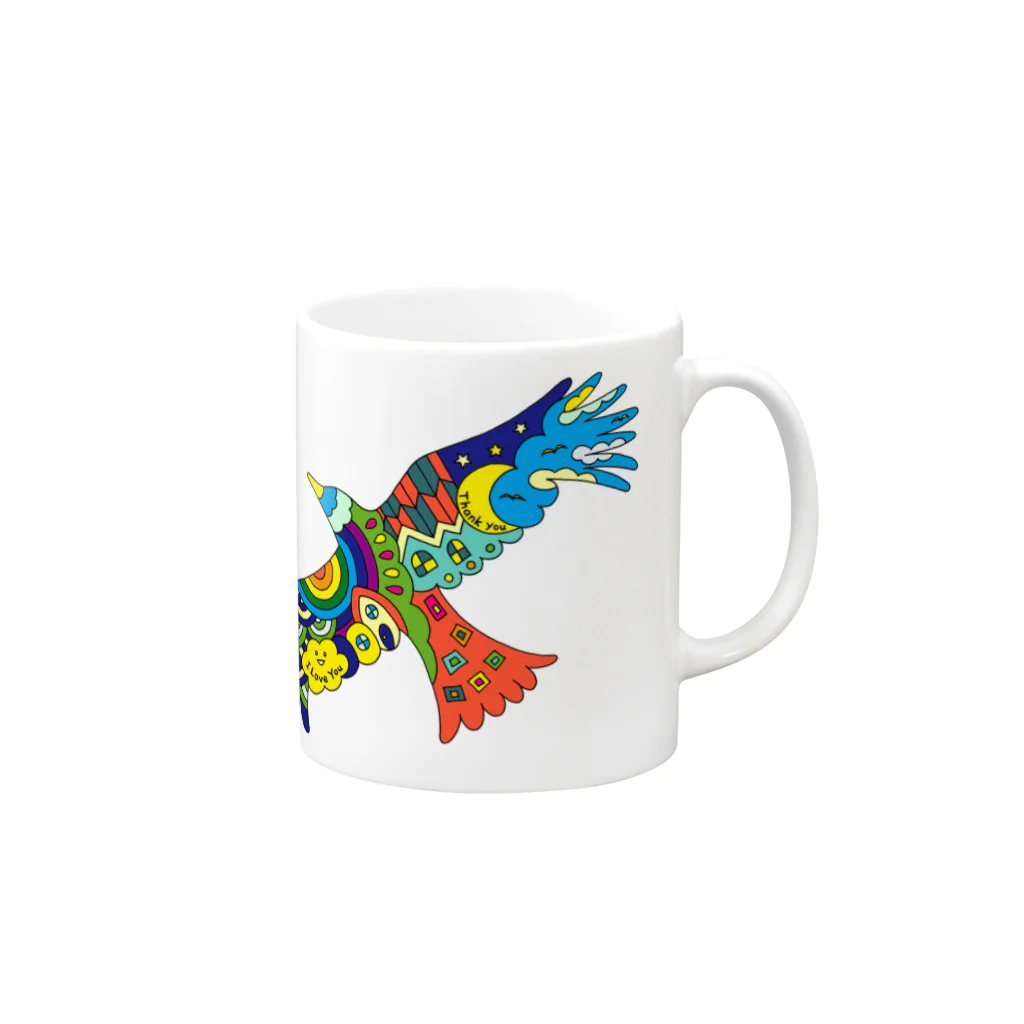 KANAT  LAMHITAの虹色の飛ぶ鳥 マグカップの取っ手の右面