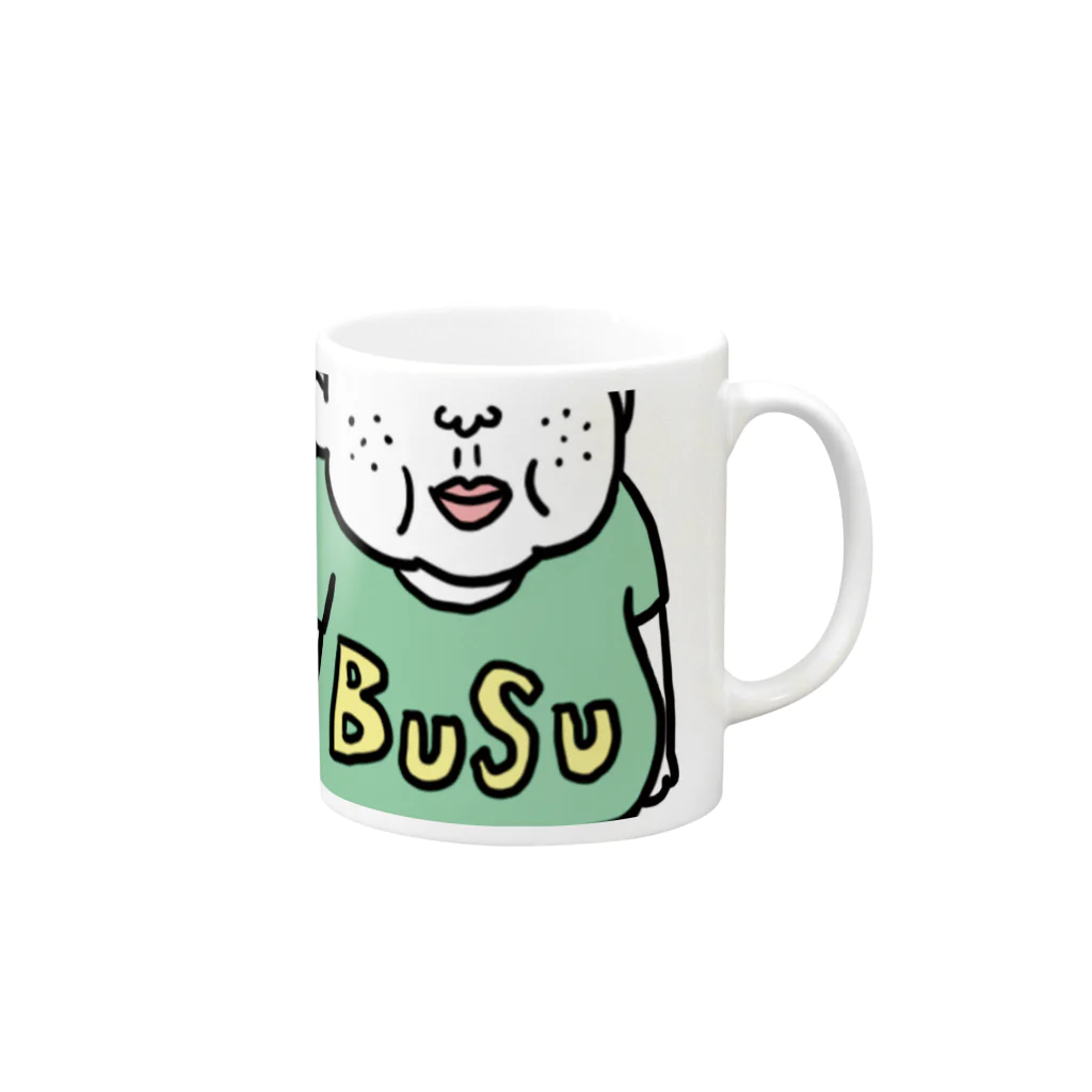 キャロライン企画の憎めないブス顔マグ男 Mug :right side of the handle