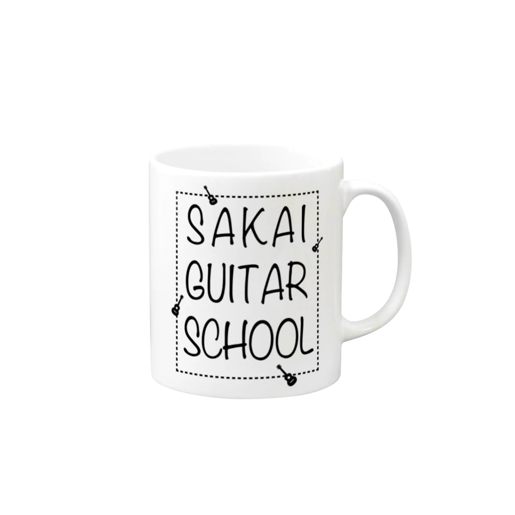 TACAのグッズ売り場のSAKAI GUITAR SCHOOL 黒文字 マグカップの取っ手の右面