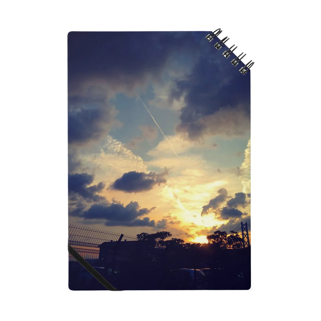 どうもりのブツの海沿いの夕焼け Notebook