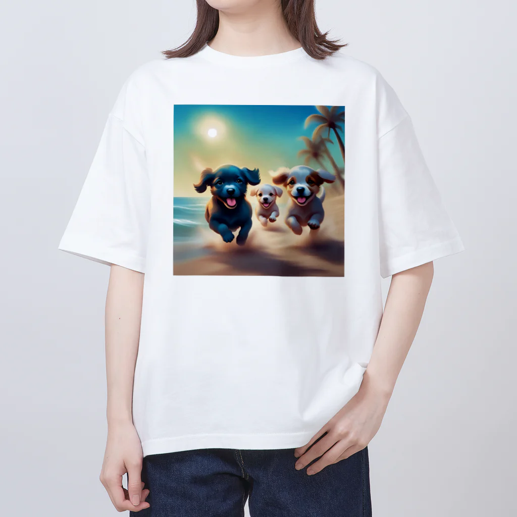 Chocolat15sucreの砂浜で遊ぶ子犬たち Oversized T-Shirt