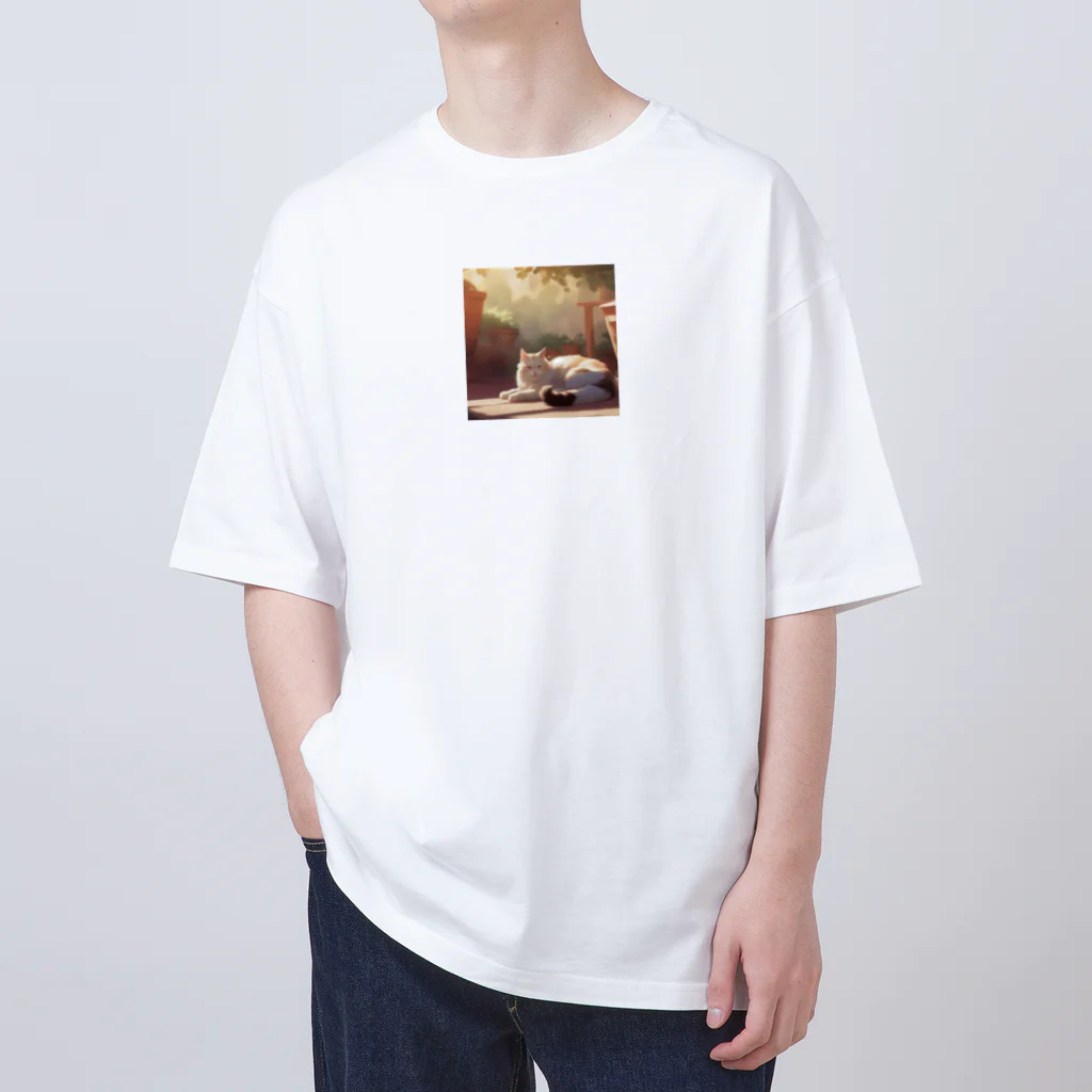  ニャンダーランド・イラストストアの日光浴をしている猫 Oversized T-Shirt