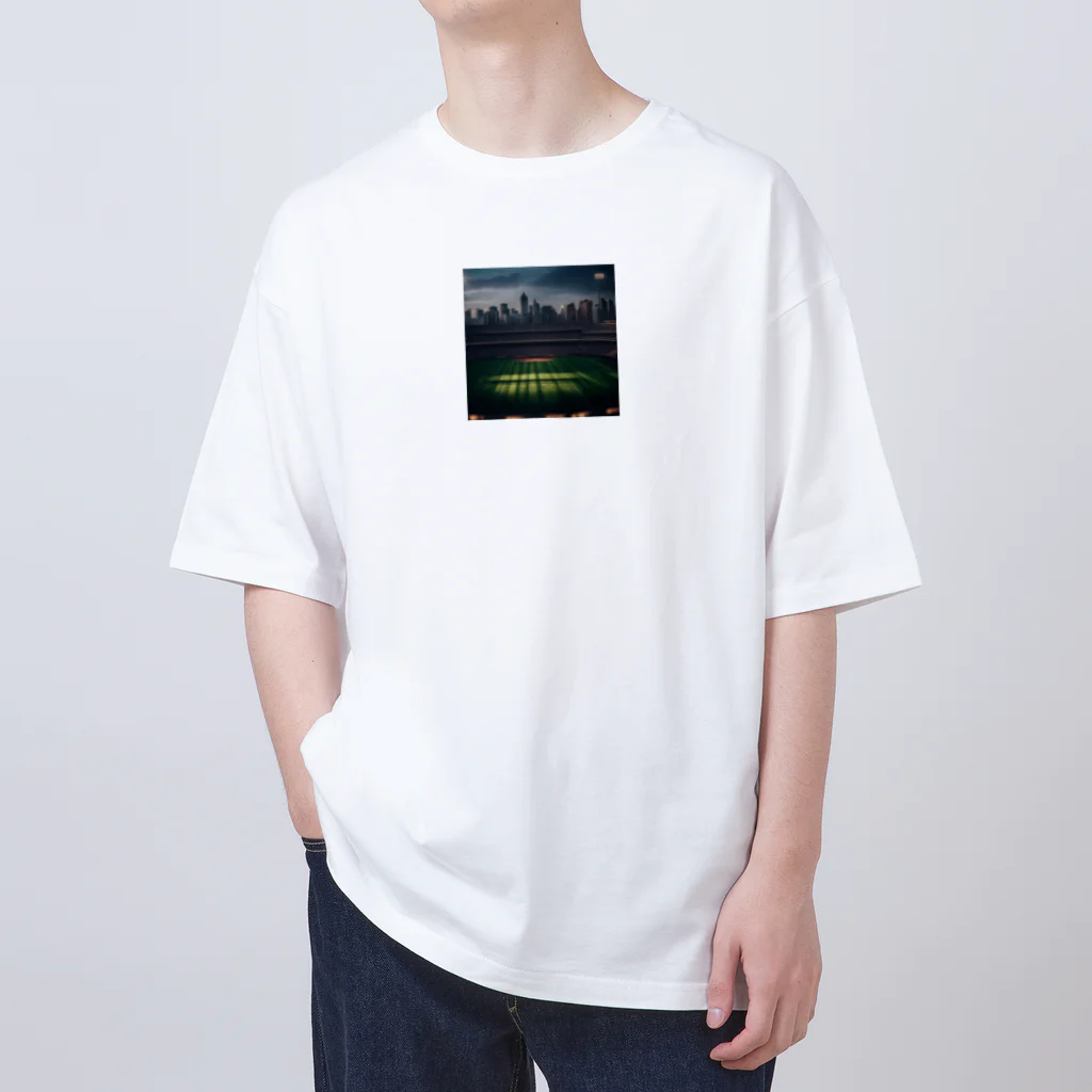 dream_canvasの空にそびえる高層ビルとスポーツスタジアムの壮大な景色。 Oversized T-Shirt