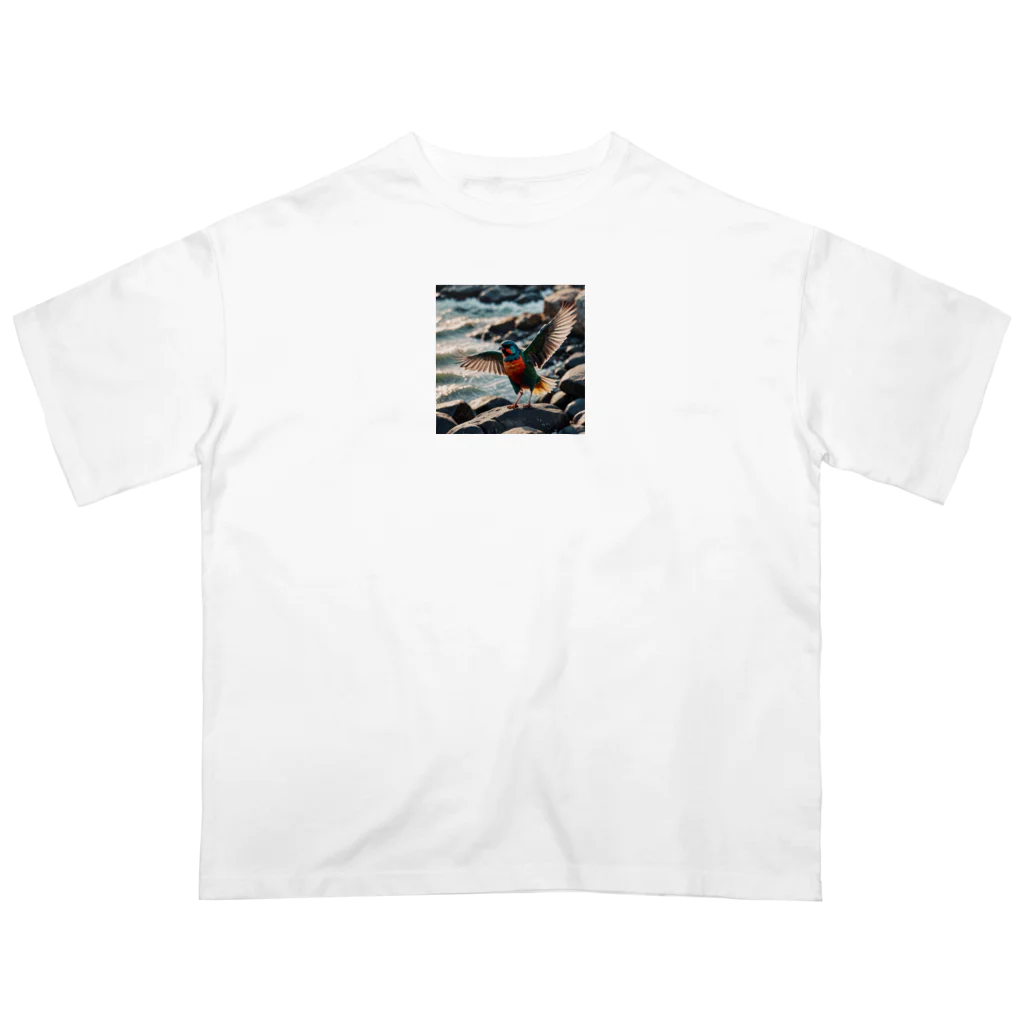 snow-birdの波打ち際で羽ばたく色鮮やかな鳥 オーバーサイズTシャツ