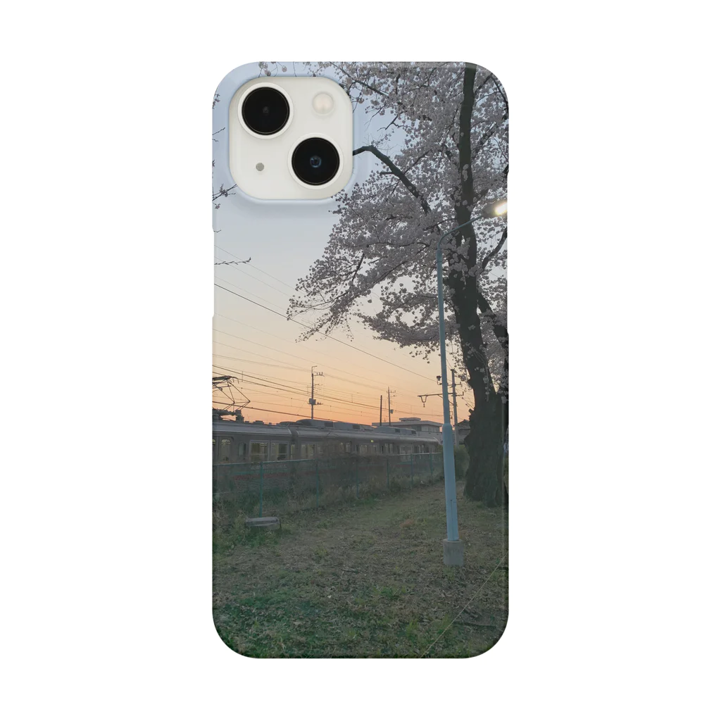 yoyoyo-yoyoの夕方の電車と桜 Smartphone Case