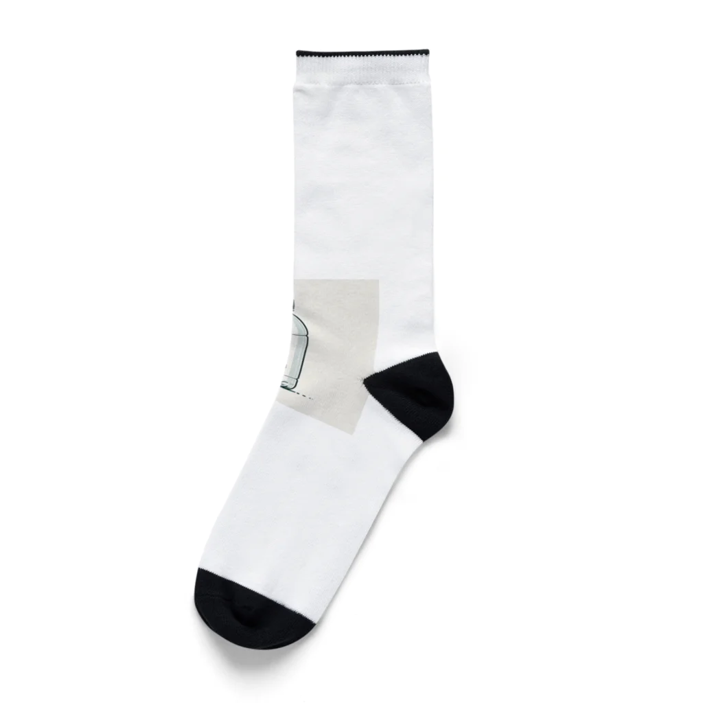 うみねこーひーの容器の中の種 Socks