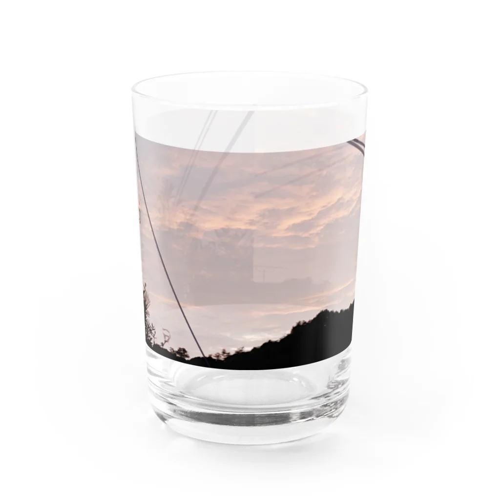 galaxycatの手の中の夕焼け Water Glass :front