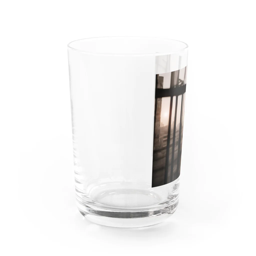 shell_hutの窓から覗く荒廃した建物が立ち並ぶ無人の通り Water Glass :left