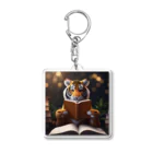 クロスクリエイティブの本を読んでいるトラ Acrylic Key Chain