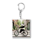 junpeiganba07の街の中を自転車で走るパンダ Acrylic Key Chain