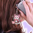 旅猫王子れぉにゃん👑😼公式(©️レイラゆーし。©️ Layla-246yuusi.)の和菓子屋🍑ももちゃんアクリルキーホルダー Acrylic Key Chain