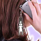 ドコムス刷りのにせもの Acrylic Key Chain