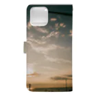 Issei Mの夕暮れの海と風車 Book-Style Smartphone Case :back