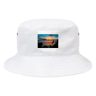 KSK SHOPの海と夕陽のコントラスト Bucket Hat