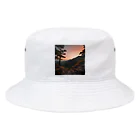 chachamaaruの夕陽が山々にそそぐ美しい光 Bucket Hat