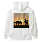 宇宙開発デザイン科の夕陽の中の馬 Heavyweight Hoodie