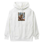 Colorful Canvasの窓辺でクッキーを食べるリス Heavyweight Hoodie