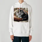 Ken17のソファのクッションの上で眠る猫 Heavyweight Hoodie