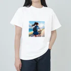 ふりむいての海岸沿いの風、自転車を漕ぐ女の子 ヘビーウェイトTシャツ