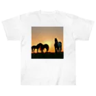 宇宙開発デザイン科の夕陽の中の馬 Heavyweight T-Shirt