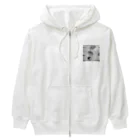 ininicoの小さな傘をさして歩いているハリネズミ Heavyweight Zip Hoodie