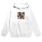 feliceのキッチンで飛び跳ねる猫 Hoodie