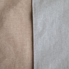 しりもとの水鳥 Mini Drawstring Bag is dusty-colored in frosty tone