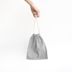 屋上コーヒーロースタリーの屋上コーヒーロースタリーロゴ Mini Drawstring Bag is large enough to hold a book or notebook