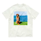 the dog is ⚫︎⚫︎ing ✖️✖️のthe dog is fishing fish オーガニックコットンTシャツ