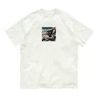 snow-birdの波打ち際で羽ばたく色鮮やかな鳥 オーガニックコットンTシャツ