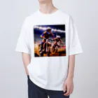 Bikers' Galleryのチャンピオンライド：モトクロスアクション Oversized T-Shirt