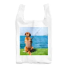 the dog is ⚫︎⚫︎ing ✖️✖️のthe dog is fishing fish Reusable Bag