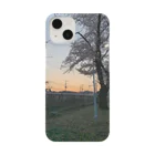 yoyoyo-yoyoの夕方の電車と桜 Smartphone Case