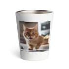 feliceのキッチンで飛び跳ねる猫 Thermo Tumbler