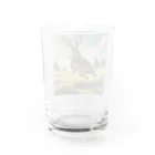 cute in cool shopの跳ねているウサギ Water Glass :back