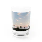 Cielの夕暮れ空とヤシの木 Water Glass :front