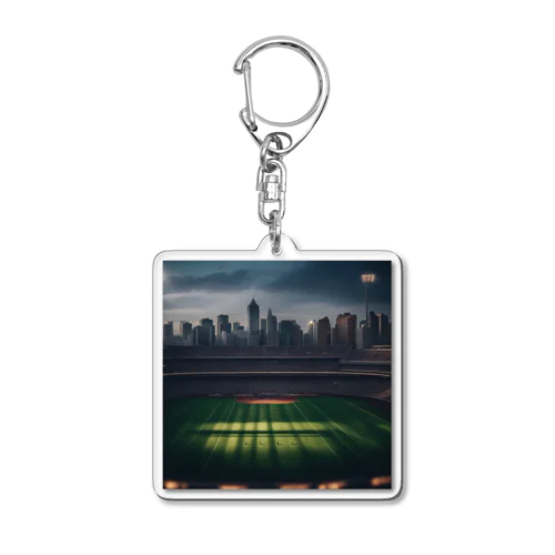 空にそびえる高層ビルとスポーツスタジアムの壮大な景色。 Acrylic Key Chain