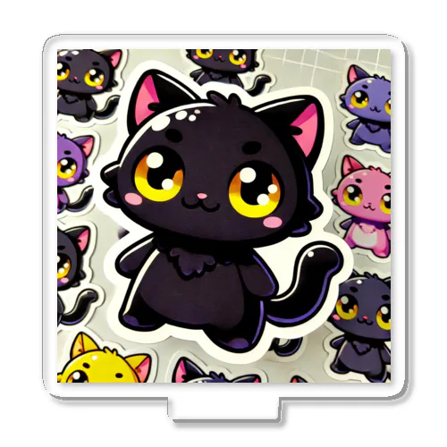 魅惑の黒猫が、カラフルな背景と調和してかわいさを放つシーン Acrylic Stand