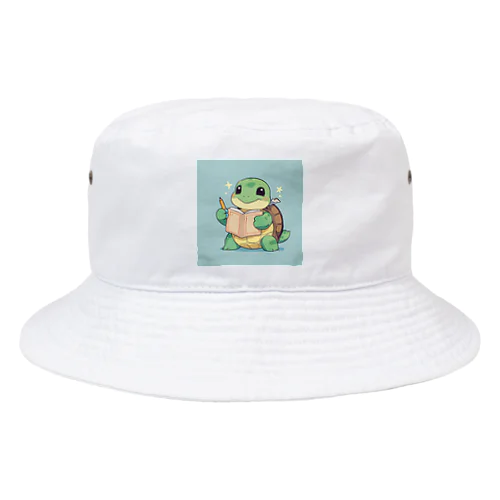 おもちゃの本を持ったかわいいカメ Bucket Hat